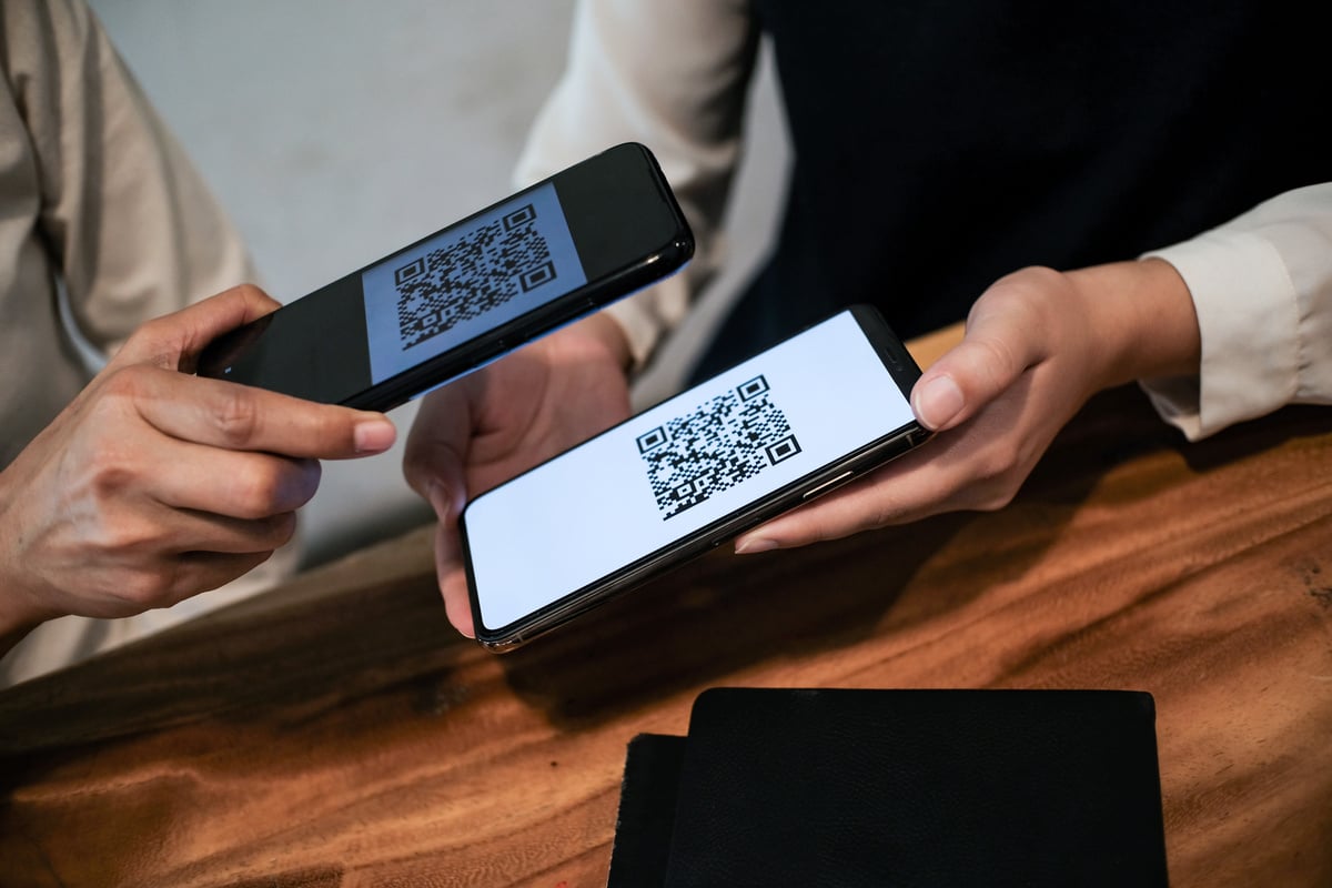 Qr Code Payment. Woman Scanning QR Code Online Shopping Cashless